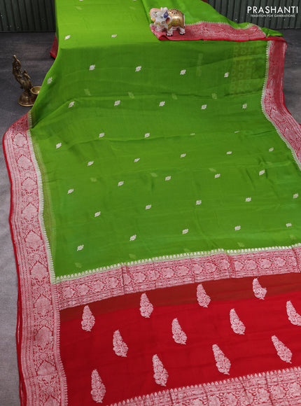 Banarasi chiffon saree green and red with allover silver zari woven buttas and silver zari woven floral border
