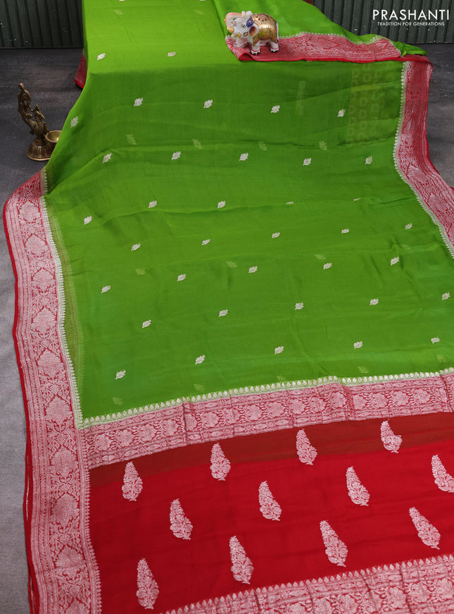 Banarasi chiffon saree green and red with allover silver zari woven buttas and silver zari woven floral border
