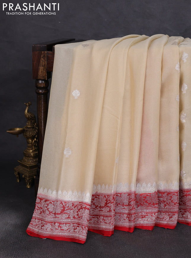 Banarasi chiffon saree cream and red with allover silver zari woven buttas and silver zari woven floral border