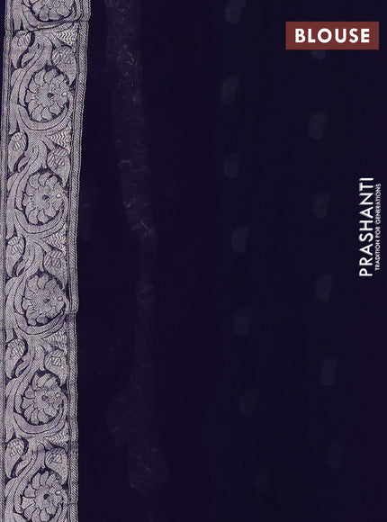 Banarasi chiffon saree peacock green and navy blue with allover silver zari woven buttas and silver zari woven floral border