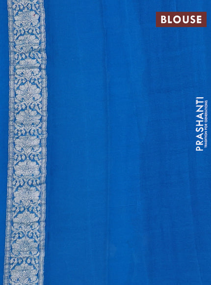 Banarasi chiffon saree purple and cs blue with allover silver zari woven paisley buttas and silver zari woven floral border