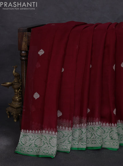 Banarasi chiffon saree maroon and green with allover silver zari woven buttas and silver zari woven floral border