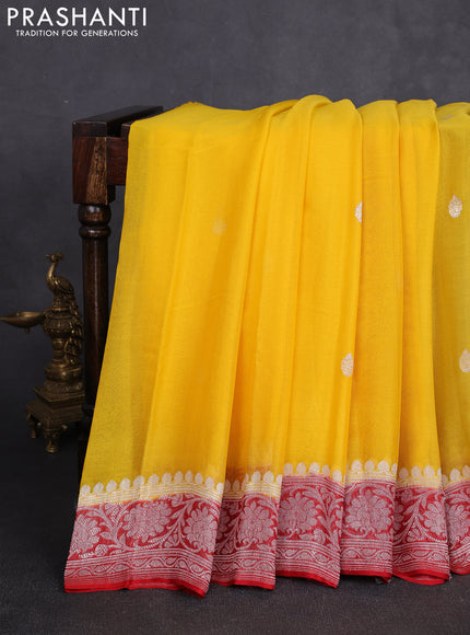 Banarasi chiffon saree mango yellow and red with allover silver zari woven buttas and silver zari woven floral border