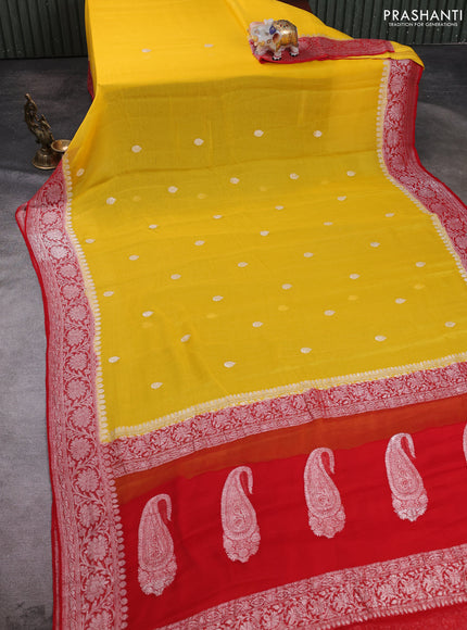 Banarasi chiffon saree mango yellow and red with allover silver zari woven buttas and silver zari woven floral border