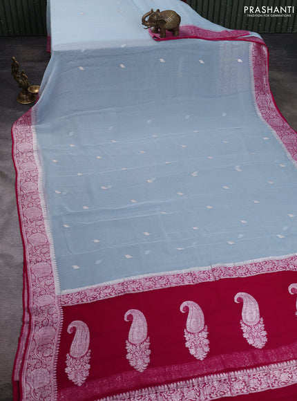 Banarasi chiffon saree pastel blue and pink with allover silver zari woven buttas and silver zari woven floral border