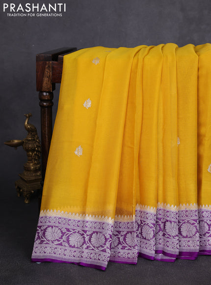 Banarasi chiffon saree yellow and purple with allover silver zari woven buttas and silver zari woven floral border