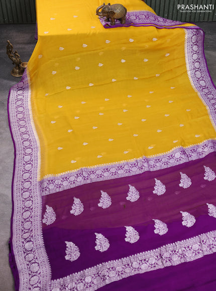 Banarasi chiffon saree yellow and purple with allover silver zari woven buttas and silver zari woven floral border
