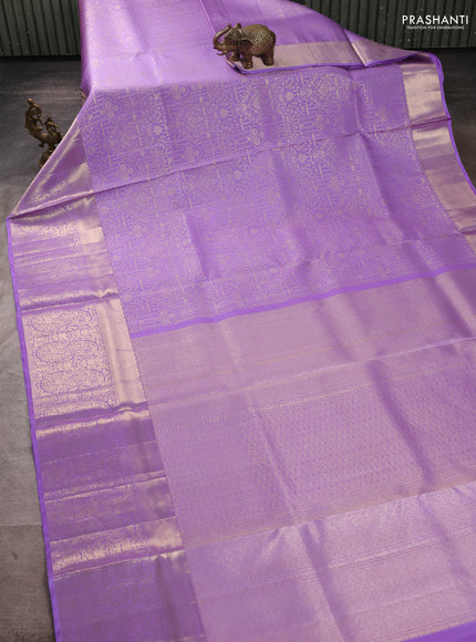 Pure kanchipuram silk saree lavender with allover zari woven brocade weaves and long rich zari woven border