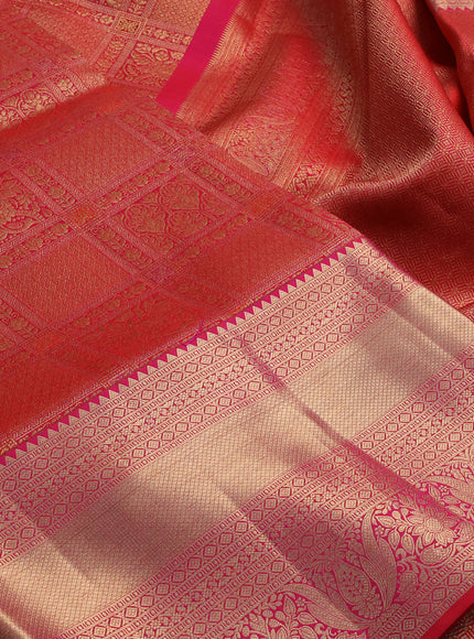 Pure kanchipuram silk saree tomato pink with allover zari woven brocade weaves and long rich zari woven border