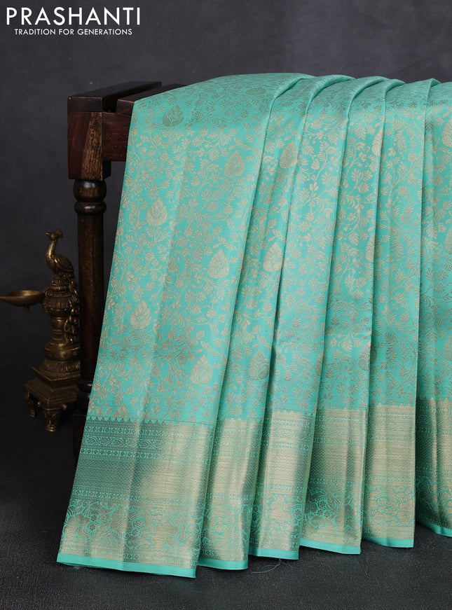 Pure kanchipuram silk saree teal green with allover zari woven brocade weaves and long rich zari woven border