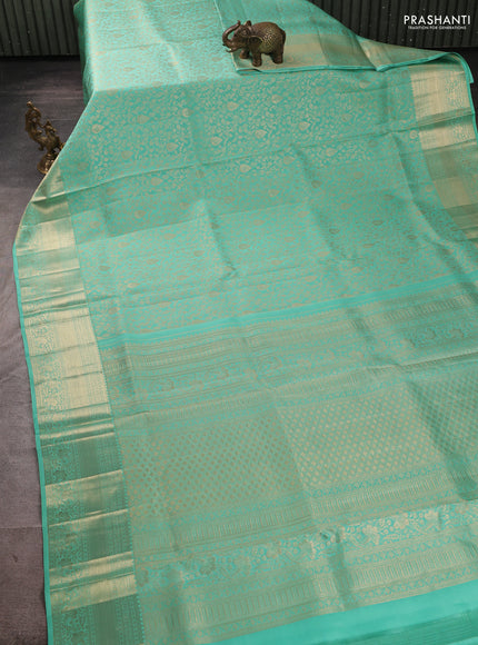 Pure kanchipuram silk saree teal green with allover zari woven brocade weaves and long rich zari woven border
