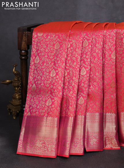 Pure kanchipuram silk saree dual shade of pinkish orange with allover zari woven brocade weaves and rich zari woven border