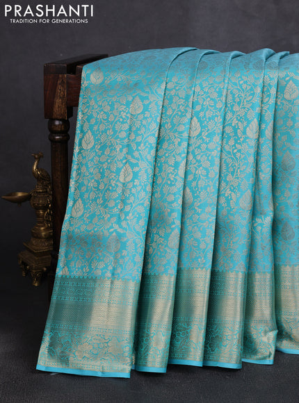 Pure kanchipuram silk saree teal blue with allover zari woven brocade weaves and rich zari woven border