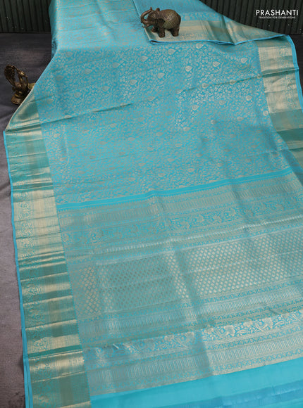 Pure kanchipuram silk saree teal blue with allover zari woven brocade weaves and rich zari woven border