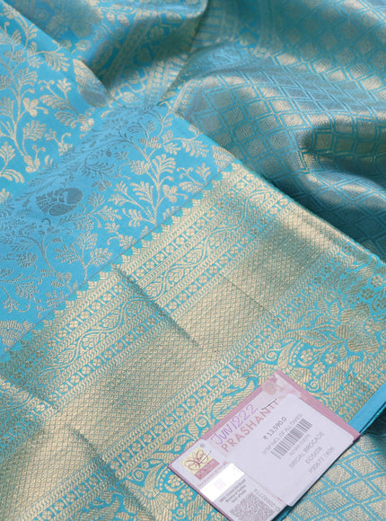 Pure kanchipuram silk saree teal blue with allover zari woven brocade weaves and rich zari woven border