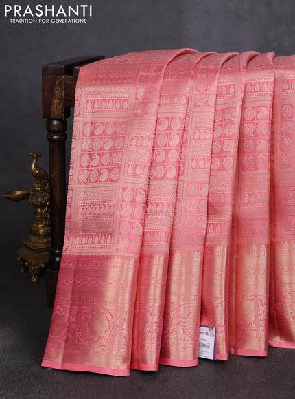 Pure kanchipuram silk saree peach pink with allover zari woven brocade weaves and rich zari woven border