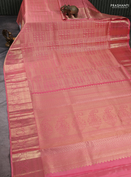 Pure kanchipuram silk saree peach pink with allover zari woven brocade weaves and rich zari woven border