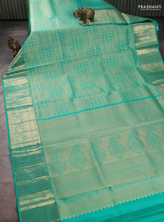 Pure kanchipuram silk saree teal green with allover zari woven brocade weaves and rich zari woven border