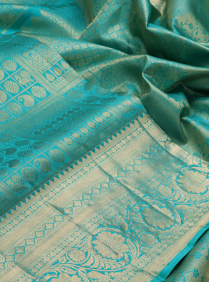 Pure kanchipuram silk saree teal green with allover zari woven brocade weaves and rich zari woven border