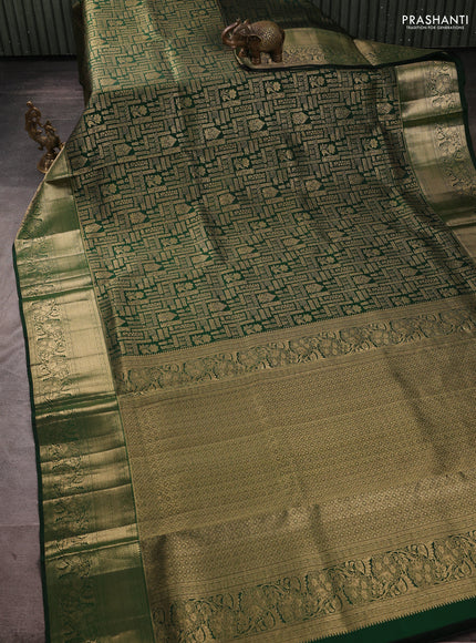 Pure kanchipuram silk saree bottle green with allover zari woven brocade weaves and rich zari woven border