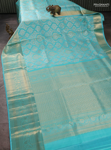 Pure kanchipuram silk saree teal blue with allover zari woven brocade weaves and long rich zari woven border