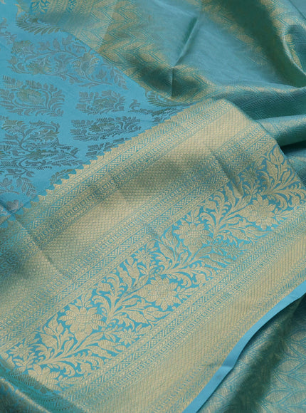 Pure kanchipuram silk saree teal blue with allover zari woven brocade weaves and long rich zari woven border