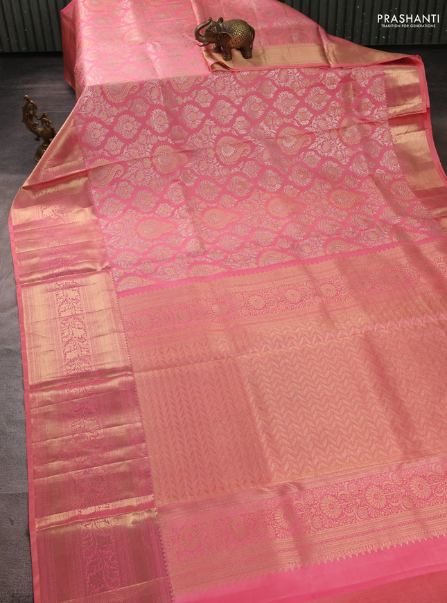 Pure kanchipuram silk saree peach pink with allover zari woven brocade weaves and long rich zari woven border