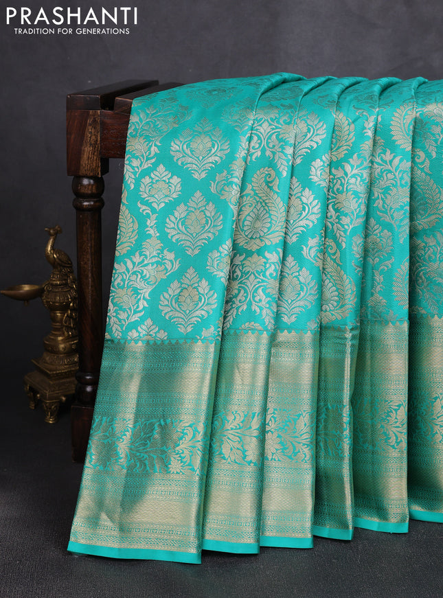Pure kanchipuram silk saree teal green with allover zari woven brocade weaves and long rich zari woven border