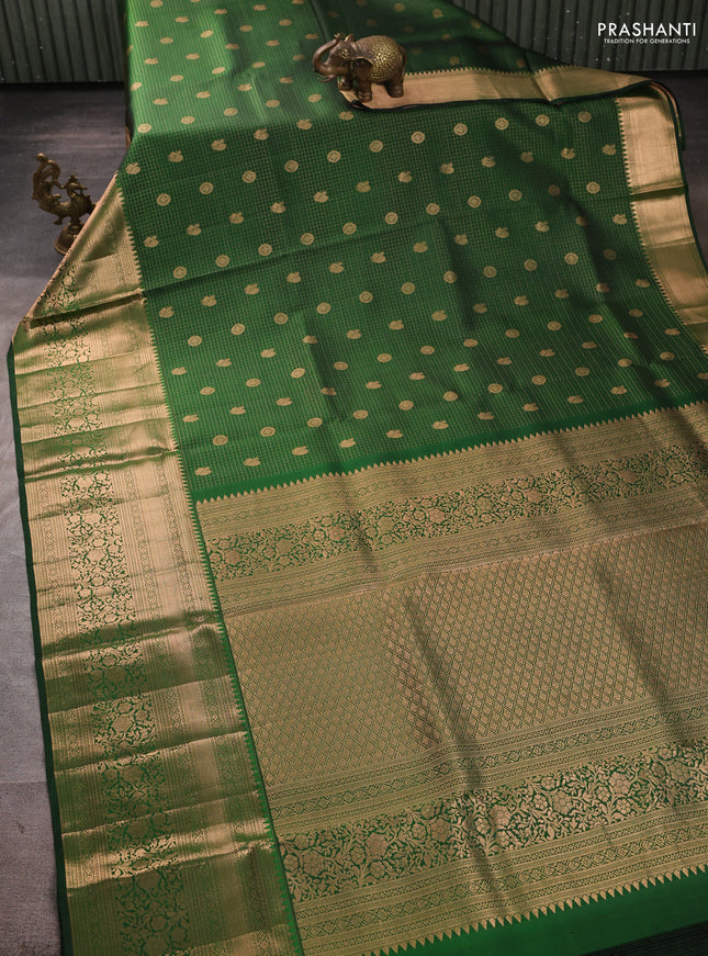 Pure kanchipuram silk saree bottle green with allover zari small checks & buttas and long rich zari woven border