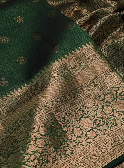 Pure kanchipuram silk saree bottle green with allover zari small checks & buttas and long rich zari woven border