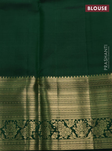 Pure kanchipuram silk saree bottle green with allover zari small checks & buttas and long rich zari woven border