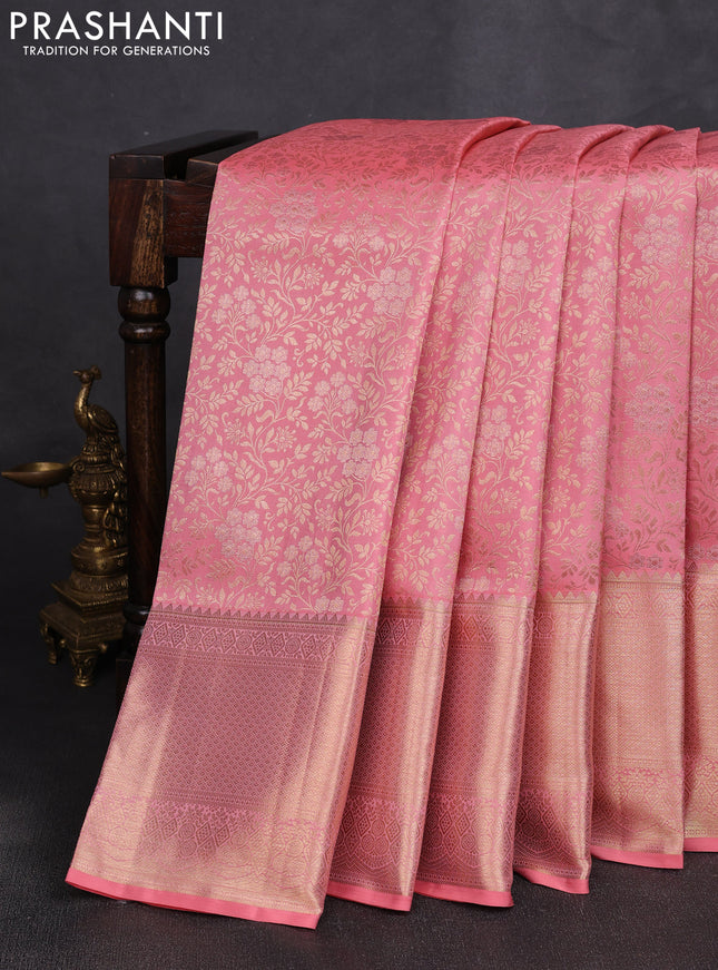 Pure kanchipuram silk saree peach pink with allover brocade weaves and long rich zari woven border