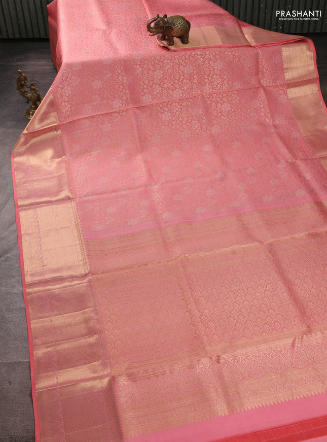 Pure kanchipuram silk saree peach pink with allover brocade weaves and long rich zari woven border