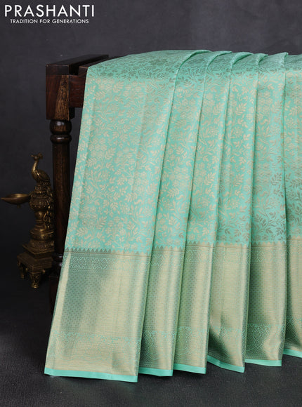 Pure kanchipuram silk saree teal green with allover brocade weaves and long rich zari woven border