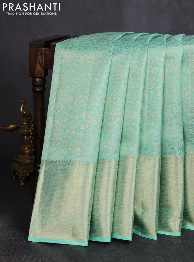 Pure kanchipuram silk saree teal green with allover brocade weaves and long rich zari woven border