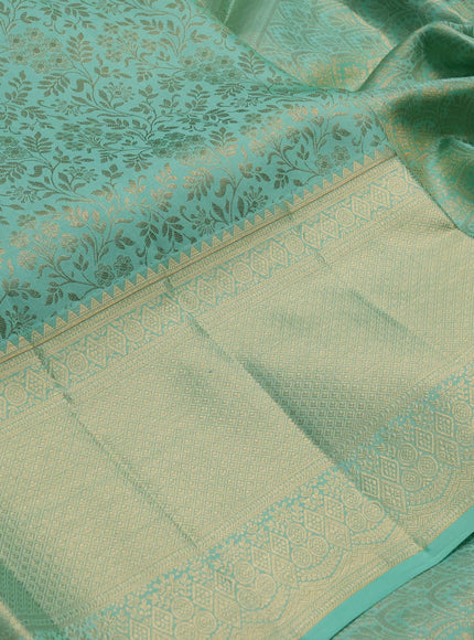 Pure kanchipuram silk saree teal green with allover brocade weaves and long rich zari woven border