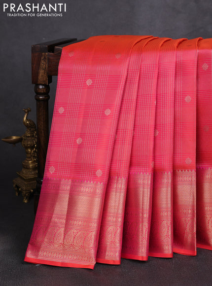 Pure kanchipuram silk saree dual shade of pinkish orange with allover zari small checks & buttas and rich zari woven border