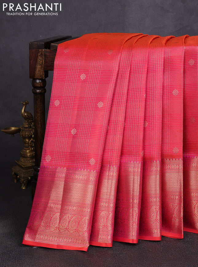 Pure kanchipuram silk saree dual shade of pinkish orange with allover zari small checks & buttas and rich zari woven border