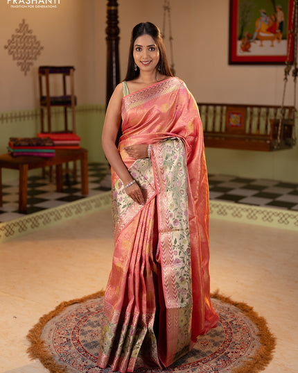 Pure kanchipuram silk saree peach pink with allover zari woven brocade weaves and long zari woven pithani border