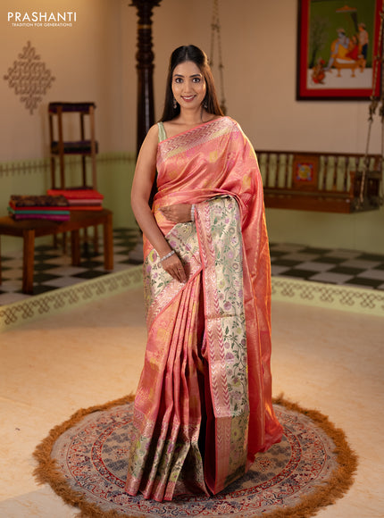 Pure kanchipuram silk saree peach pink with allover zari woven brocade weaves and long zari woven pithani border