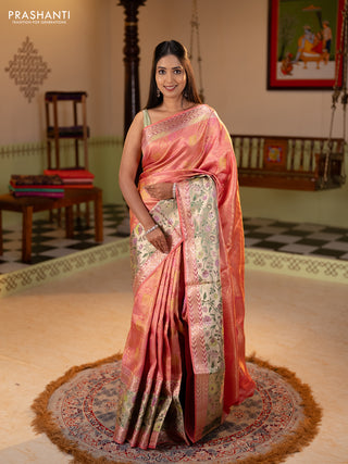Pure kanchipuram silk saree peach pink with allover zari woven brocade weaves and long zari woven pithani border