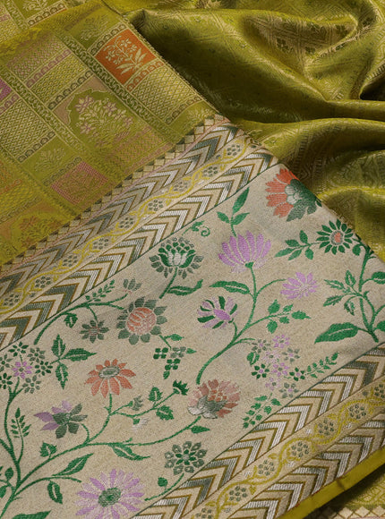 Pure kanchipuram silk saree lime green with allover zari woven brocade weaves and long zari woven pithani border