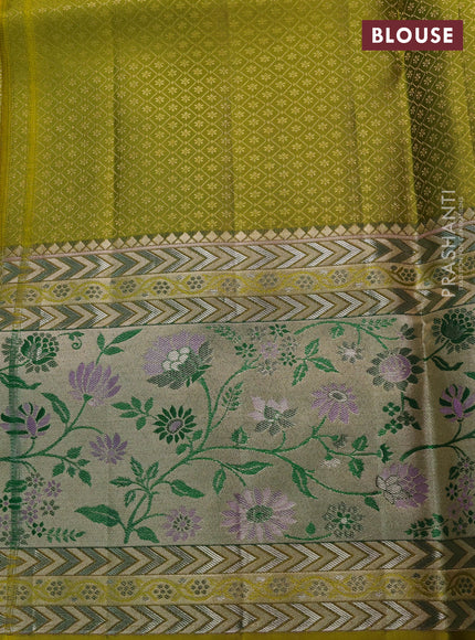 Pure kanchipuram silk saree lime green with allover zari woven brocade weaves and long zari woven pithani border