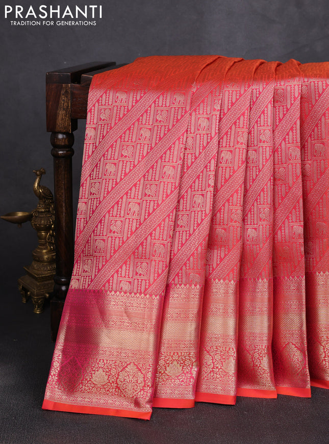 Pure kanchipuram silk saree orange with allover zari woven brocade weaves and long rich zari woven border