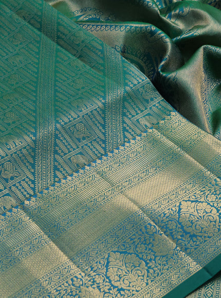 Pure kanchipuram silk saree green with allover zari woven brocade weaves and long rich zari woven border