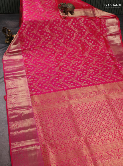 Pure kanchipuram silk saree dual shade of pinkish orange with allover zari woven brocade weaves and long rich zari woven border