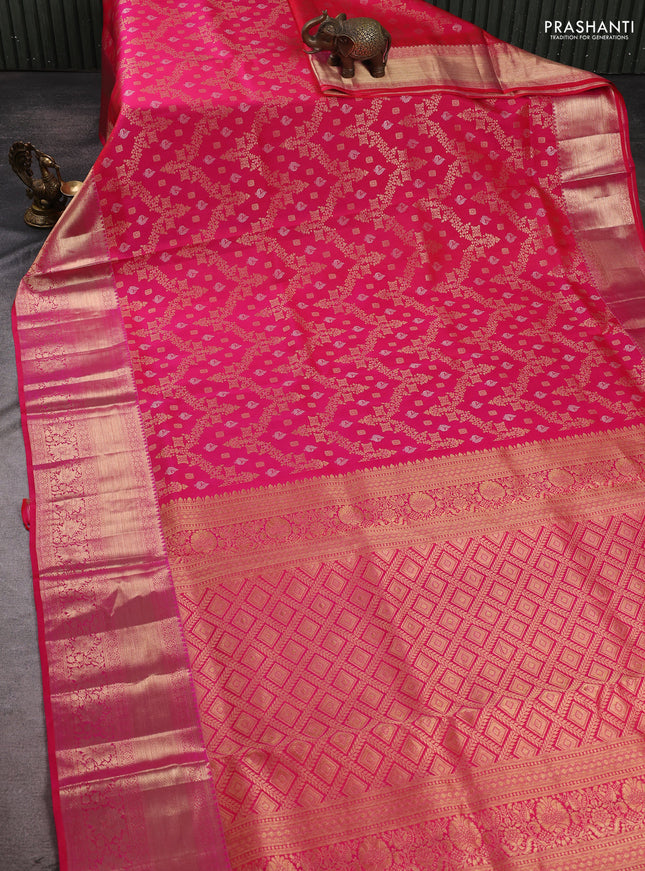 Pure kanchipuram silk saree dual shade of pinkish orange with allover zari woven brocade weaves and long rich zari woven border