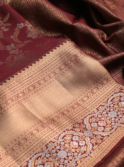 Pure kanchipuram silk saree deep maroon with allover zari woven brocade weaves and long zari woven border