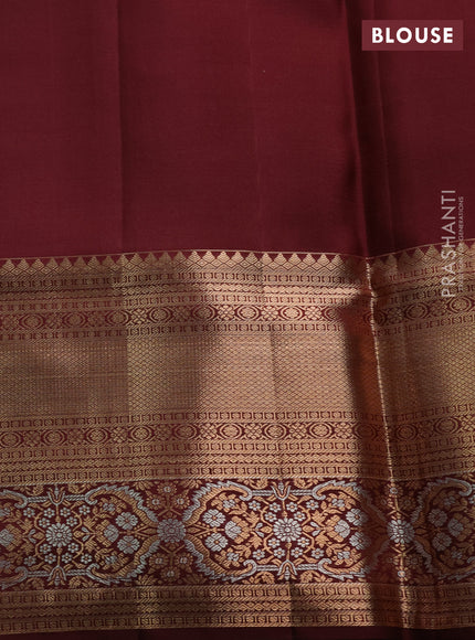 Pure kanchipuram silk saree deep maroon with allover zari woven brocade weaves and long zari woven border