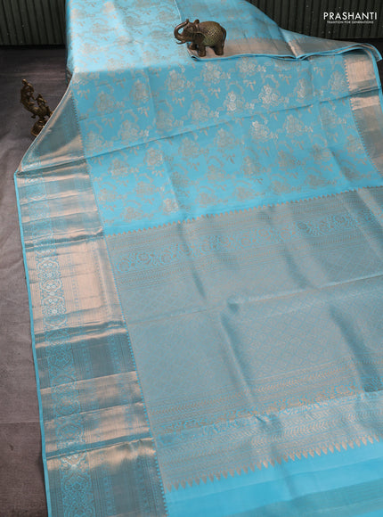 Pure kanchipuram silk saree teal blue with allover zari woven brocade weaves and long zari woven border